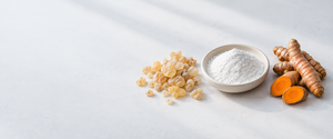 Editorial ingredient illustration of Boswellia resin, MSM powder and turmeric on a light background.